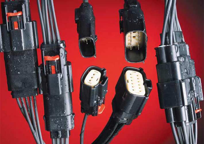 Foto Sistema de conector sellado de montaje en panel e híbrido para vehículos.